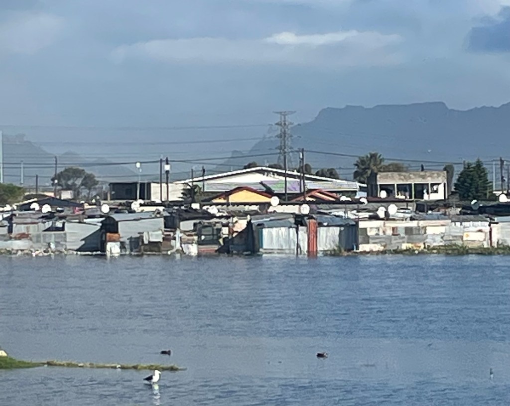 An Investigative Analysis of Environmental Justice Principles in Green Stormwater Infrastructure in USA and RSA